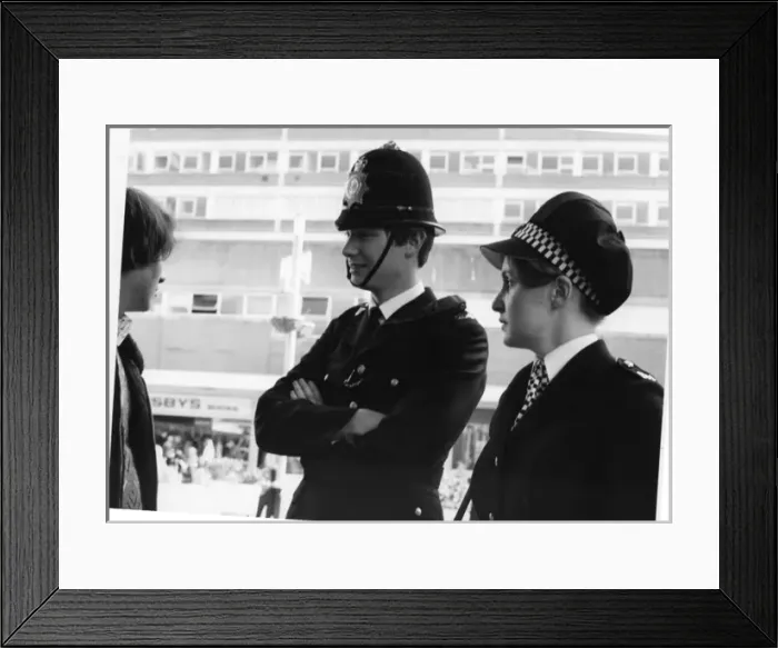 Framed Print : Male and female police officers on duty in London Framed Print : Male and female police officers on duty in London