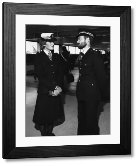 Framed Print : Male and female police officers on duty in London Framed Print : Male and female police officers on duty in London