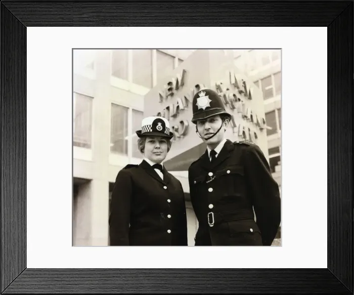 Framed Print : Male and female police officers on duty in London Framed Print : Male and female police officers on duty in London