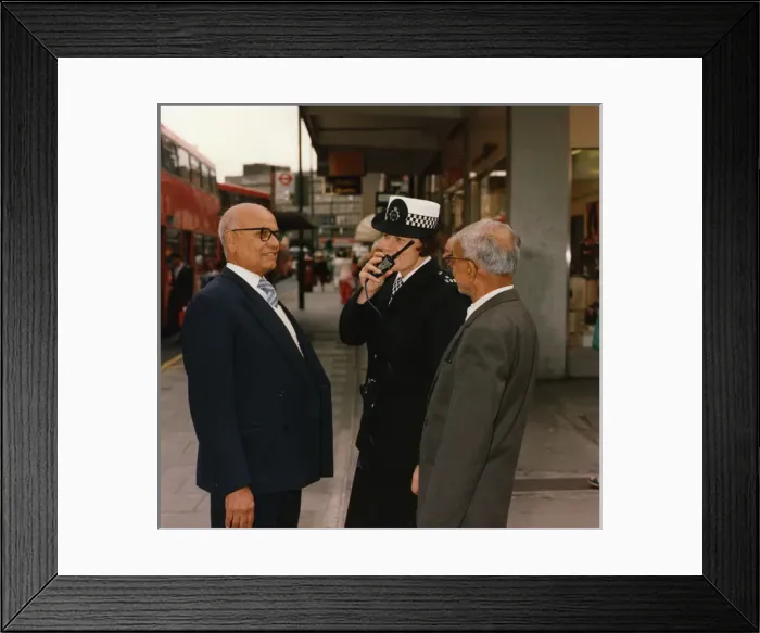 Framed Print : Woman police officer on duty in London Framed Print : Woman police officer on duty in London