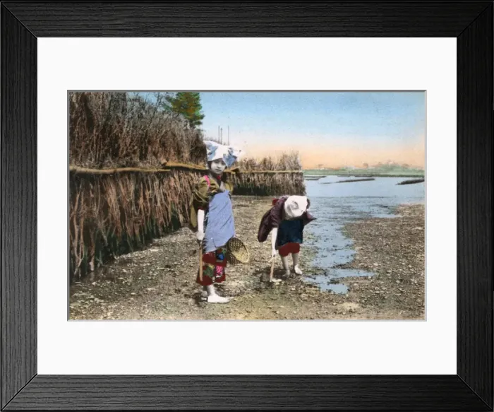 Framed Print : Japan, Two children digging for shellfish, low tide riverbed Framed Print : Japan, Two children digging for shellfish, low tide riverbed