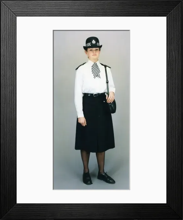 Framed Print : Woman police officer in white shirt and bowler hat, London Framed Print : Woman police officer in white shirt and bowler hat, London