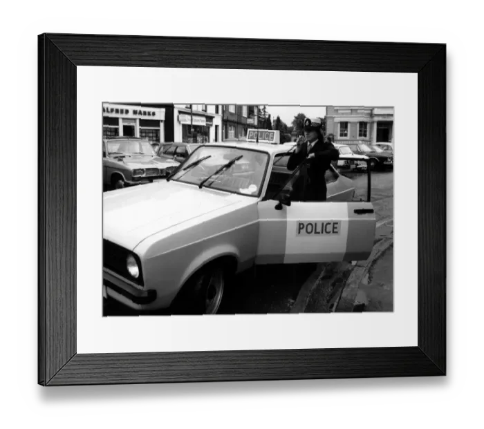 Framed Print : Woman police officer with car and radio, Egham, Surrey Framed Print : Woman police officer with car and radio, Egham, Surrey