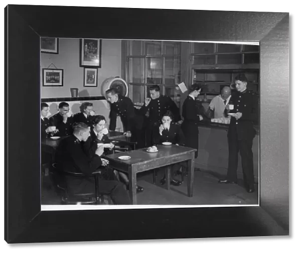 Police officers in canteen at Peel House, London