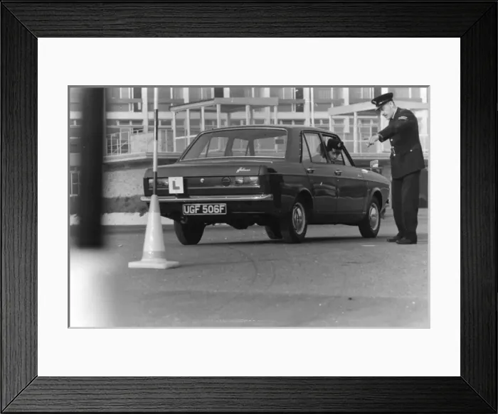 Framed Print : Woman police officer undergoing driving training Framed Print : Woman police officer undergoing driving training