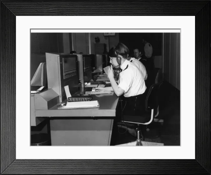 Framed Print : Police officers at work in communications room Framed Print : Police officers at work in communications room