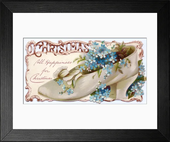 Framed Print : Flowers growing in a shoe on a Christmas card Framed Print : Flowers growing in a shoe on a Christmas card