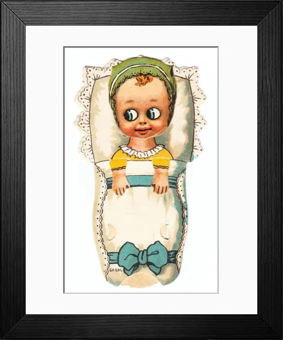 Framed Print : Baby in a cot on a greetings card Framed Print : Baby in a cot on a greetings card
