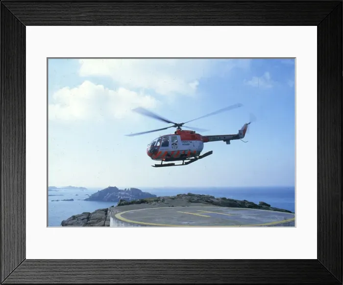 Framed Print : Service Helicopter and Round Island - Scillies Framed Print : Service Helicopter and Round Island - Scillies