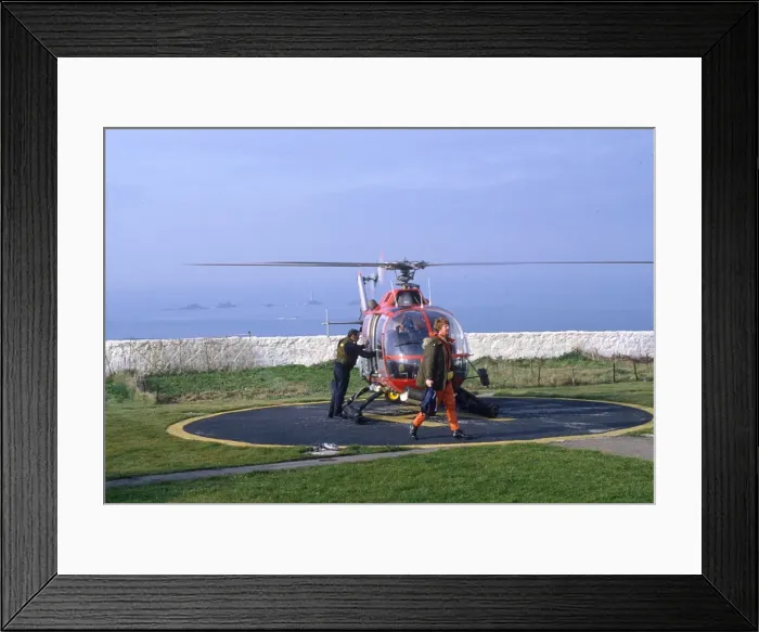 Framed Print : Lighthouse Keepers and Service Helicopter Framed Print : Lighthouse Keepers and Service Helicopter