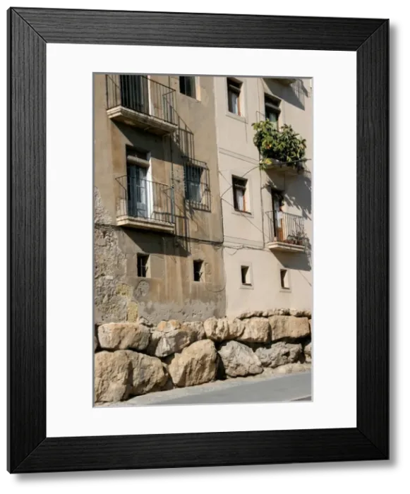 Framed Print : Spain. Catalonia. Tarragona. Houses and the roman cyclopean Framed Print : Spain. Catalonia. Tarragona. Houses and the roman cyclopean