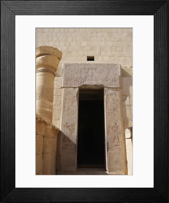 Framed Print : Temple of Hatshepsut. Door with polychrome reliefs represent Framed Print : Temple of Hatshepsut. Door with polychrome reliefs represent