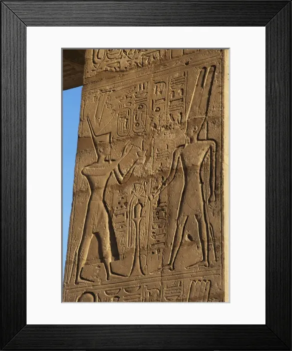 Framed Print : Relief depicting a Pharaoh making offerings to the god Amun Framed Print : Relief depicting a Pharaoh making offerings to the god Amun