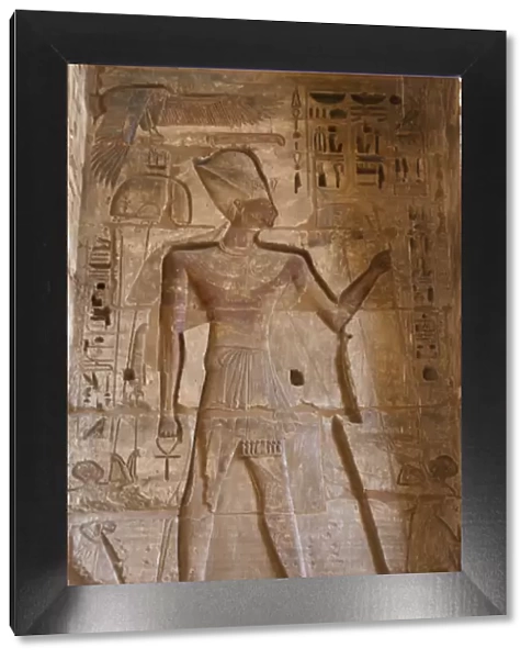 Temple of Ramses III. The pharaoh Ramses III with Khepresh
