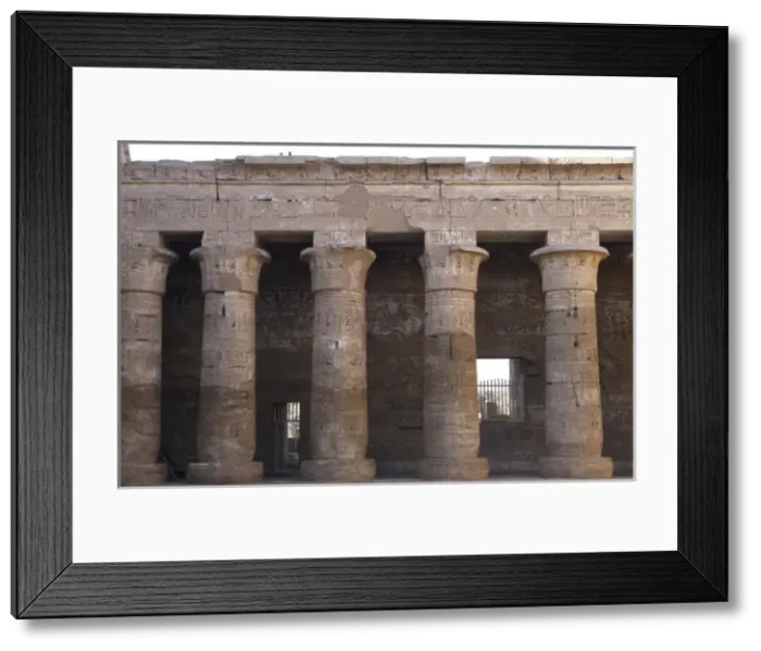 Framed Print : Temple of Ramses III. Colonnade with capitals shaped like a Framed Print : Temple of Ramses III. Colonnade with capitals shaped like a