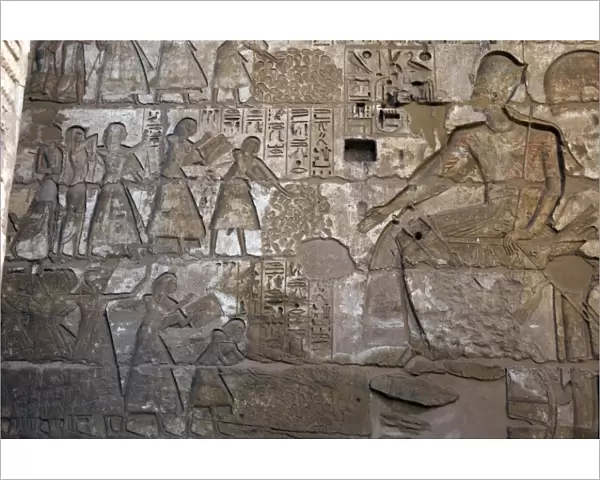 Temple of Ramses III. Officials before Ramses III, who wears