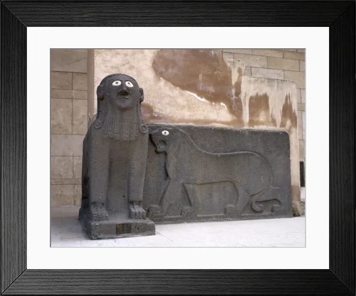Framed Print : Sphinx and a lion in relief. Basalt. Syria Framed Print : Sphinx and a lion in relief. Basalt. Syria