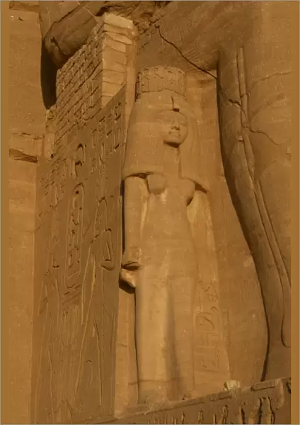 Temple of Ramses II. Nefertari. Statue near the feet of the