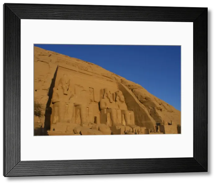 Framed Print : Egyptian art. Great Temple of Ramses II. Four colossal statu Framed Print : Egyptian art. Great Temple of Ramses II. Four colossal statu