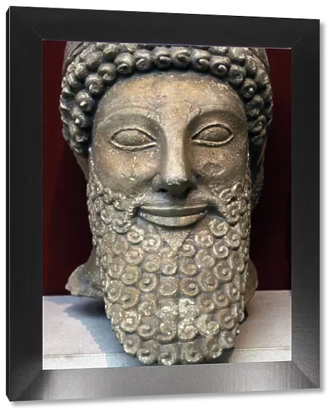 Head from a statue of a bearded man with laurel wreath. 5th