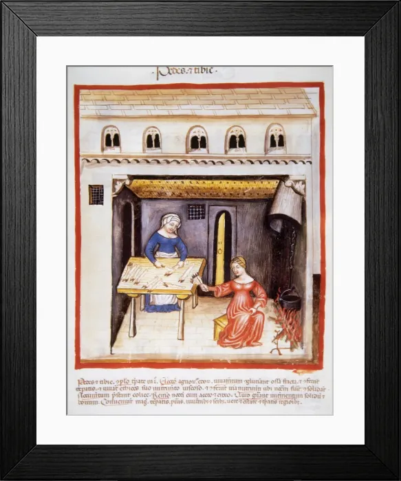 Framed Print : Tacuinum Sanitatis. 14th century. Women cutting pigs trotte Framed Print : Tacuinum Sanitatis. 14th century. Women cutting pigs trotte