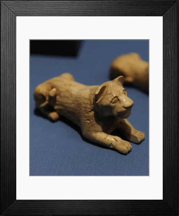 Framed Print : Lion-shaped piece of game. Ivory. From a tomb in Abydos. Ear Framed Print : Lion-shaped piece of game. Ivory. From a tomb in Abydos. Ear