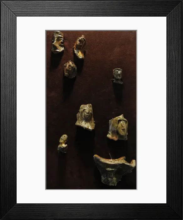 Framed Print : Latvia. 13th century. Glazed pottery fragments forms of huma Framed Print : Latvia. 13th century. Glazed pottery fragments forms of huma