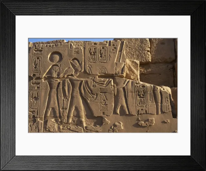 Framed Print : Egyptian Art. Karnak. The Pharaoh surrounded by two diviniti Framed Print : Egyptian Art. Karnak. The Pharaoh surrounded by two diviniti