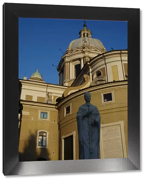 Italy. Rome. Basilica of San Carlo al Corso and statue of Sa