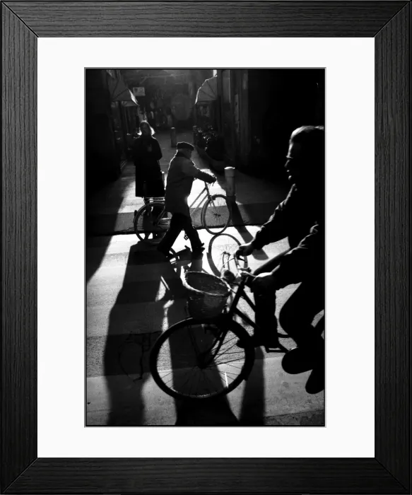 Framed Print : Shadows and cyclists, Pisa, Italy Framed Print : Shadows and cyclists, Pisa, Italy