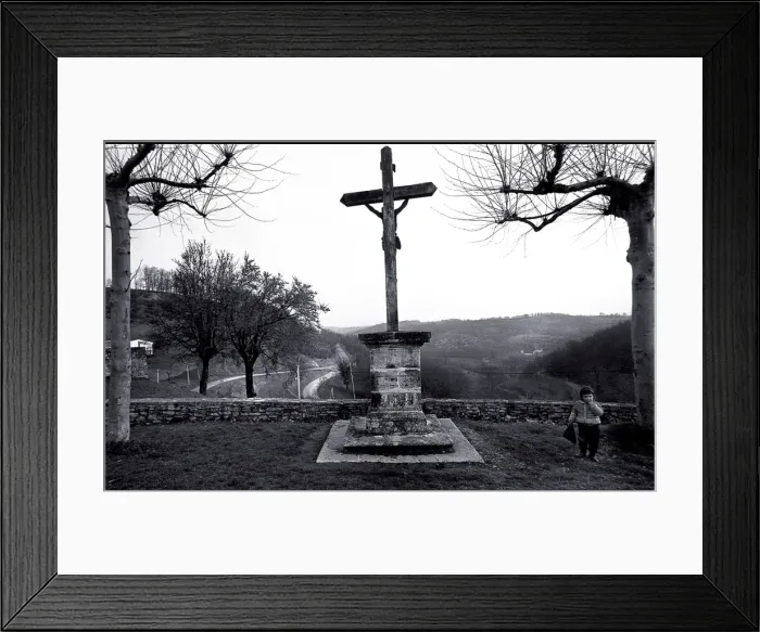 Framed Print : Child at village memorial, France Framed Print : Child at village memorial, France