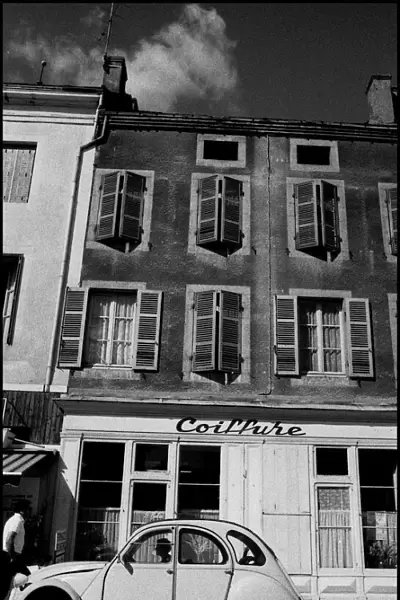 Citroen 2CV outside hairdressers, France