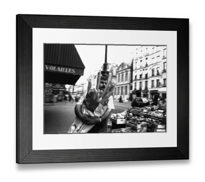 Framed Print : Man in street with baguettes, Paris, France Framed Print : Man in street with baguettes, Paris, France