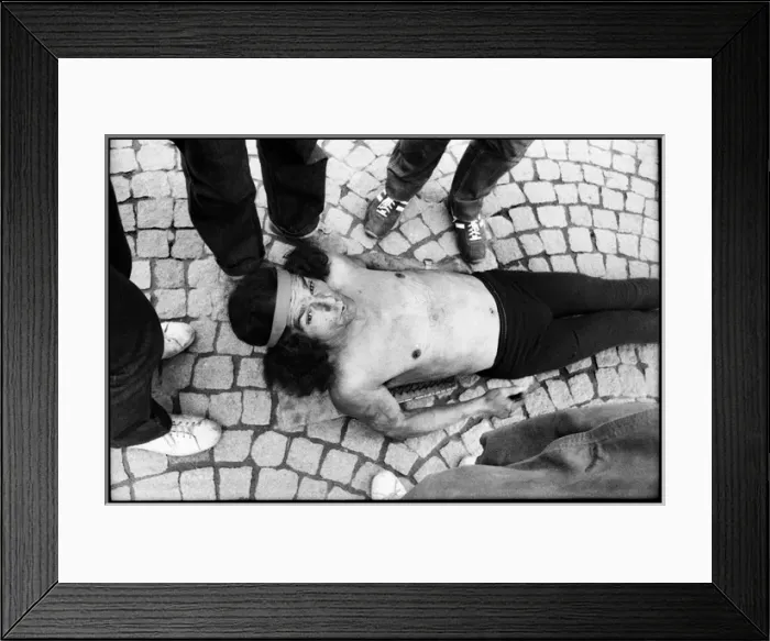 Framed Print : Man lying on bed of nails - street performer, Paris, France Framed Print : Man lying on bed of nails - street performer, Paris, France