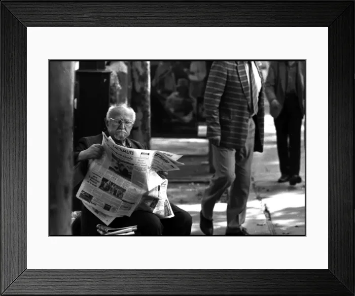 Framed Print : Old man in street, Paris with newspaper Framed Print : Old man in street, Paris with newspaper