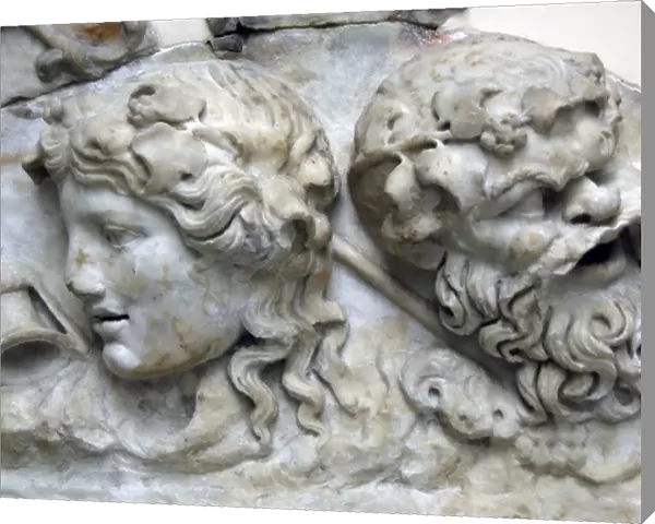 Decorative relief carved in marble with Dionysius and Silenu