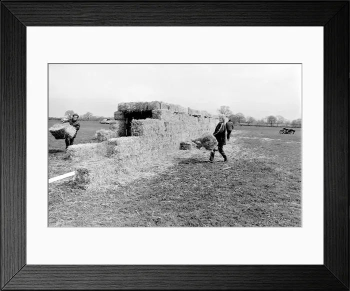 Framed Print : Stunt woman rides through flames on motorbike Framed Print : Stunt woman rides through flames on motorbike