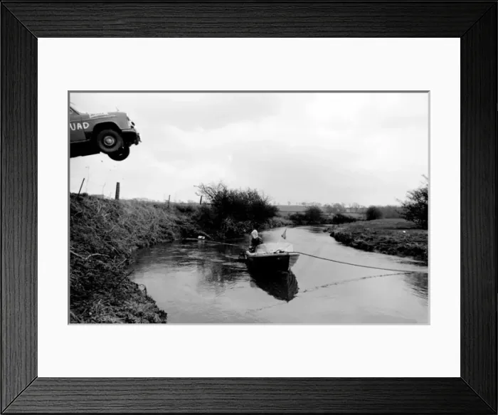 Framed Print : Stuntman attempts to fly car over river Framed Print : Stuntman attempts to fly car over river