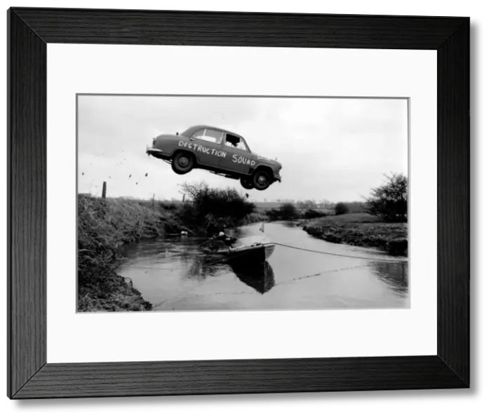 Framed Print : Stuntman attempts to fly car over river Framed Print : Stuntman attempts to fly car over river