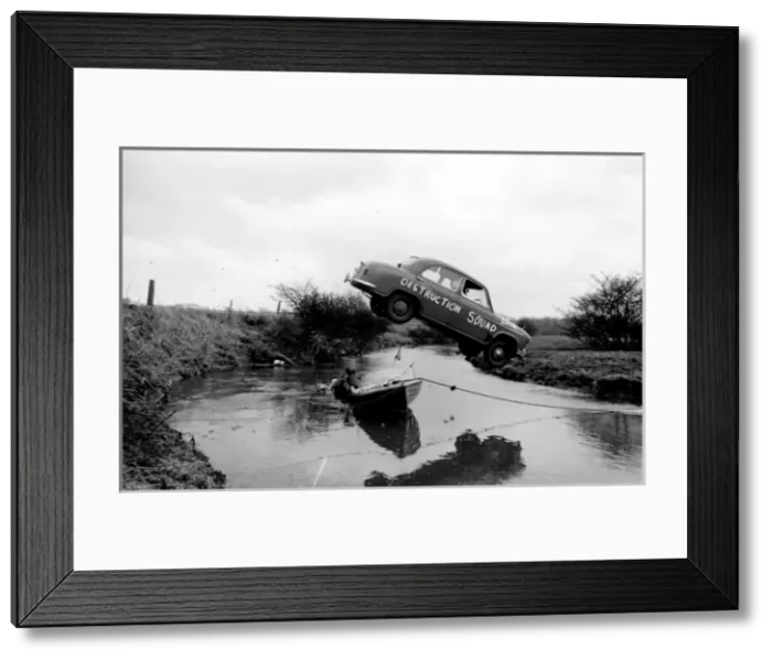 Framed Print : Stuntman attempts to fly car over river Framed Print : Stuntman attempts to fly car over river