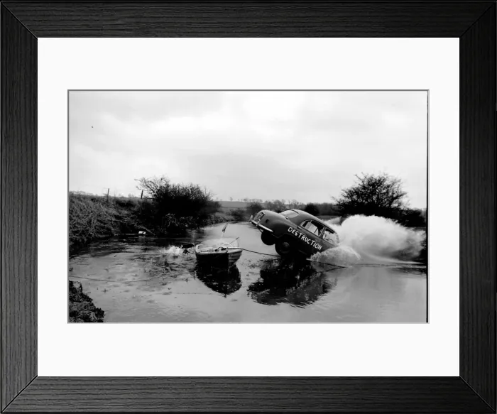 Framed Print : Stuntman attempts to fly car over river Framed Print : Stuntman attempts to fly car over river