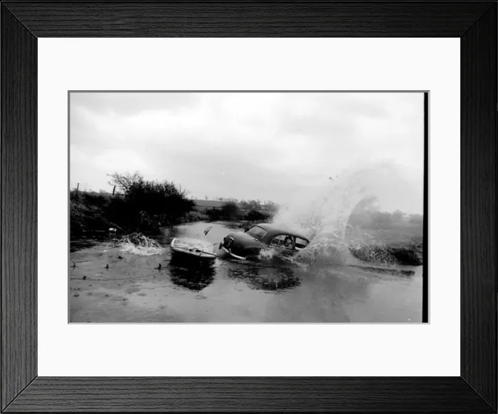 Framed Print : Stuntman attempts to fly car over river Framed Print : Stuntman attempts to fly car over river