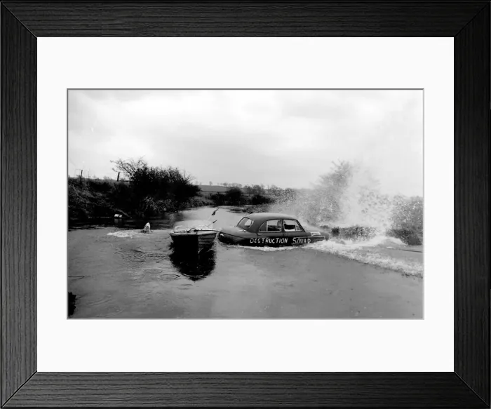 Framed Print : Stuntman attempts to fly car over river Framed Print : Stuntman attempts to fly car over river