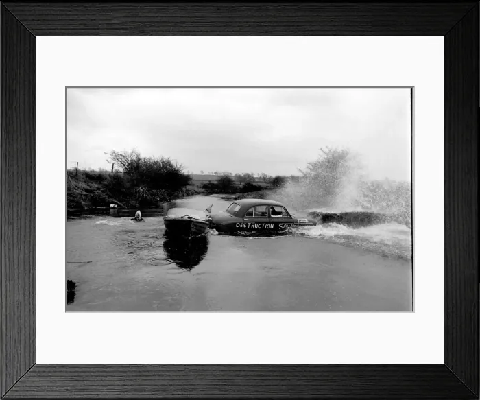 Framed Print : Stuntman attempts to fly car over river Framed Print : Stuntman attempts to fly car over river