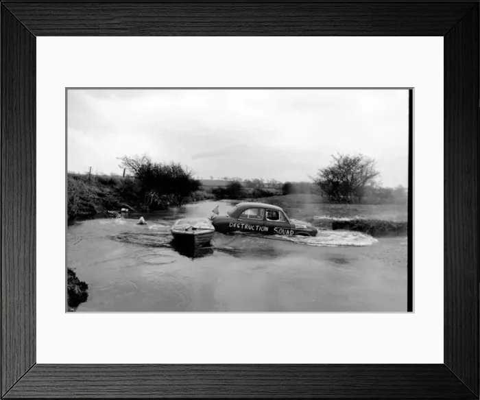 Framed Print : Stuntman attempts to fly car over river Framed Print : Stuntman attempts to fly car over river