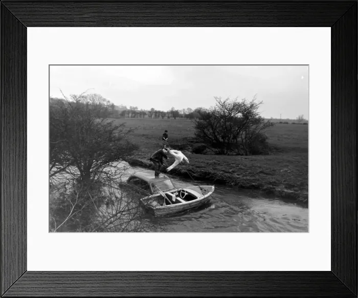 Framed Print : Stuntman attempts to fly car over river Framed Print : Stuntman attempts to fly car over river