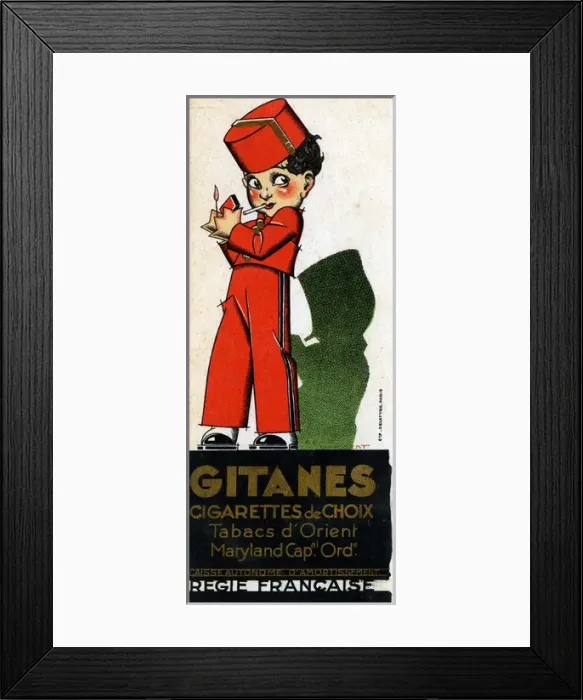Framed Print : A young bellboy lights up his Gitanes Cigarette Framed Print : A young bellboy lights up his Gitanes Cigarette