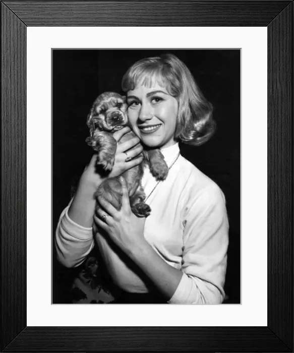 Framed Print : Susi - cuddles with a young woman Framed Print : Susi - cuddles with a young woman
