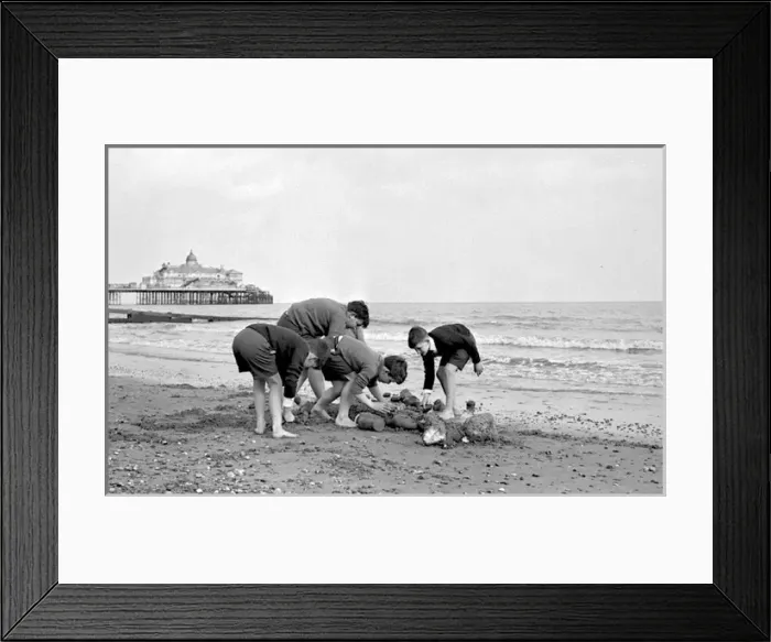 Framed Print : Boys building a sandcastle, Eastbourne, Sussex Framed Print : Boys building a sandcastle, Eastbourne, Sussex