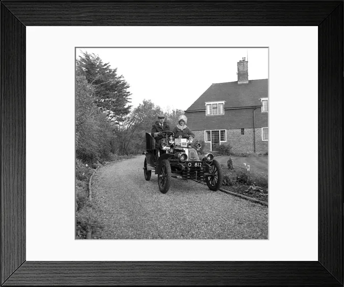 Framed Print : Couple in a vintage car Framed Print : Couple in a vintage car